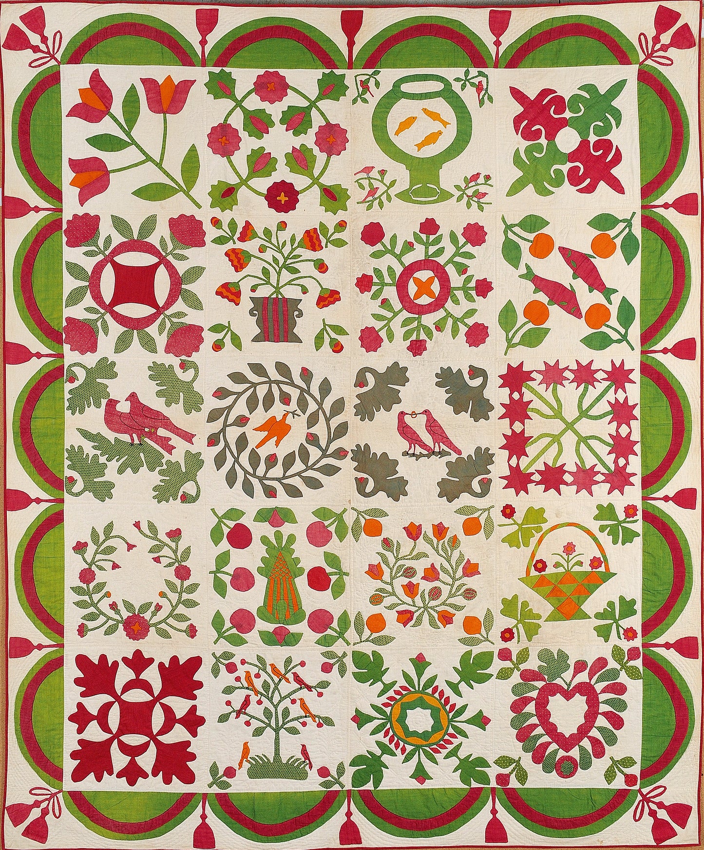 Explore the history of vibrant red and green quilts in the "Red & Green Quilts: Historical Lecture" by Creative Spark, featuring patchwork squares with floral, bird, and fruit appliqué, bordered by tulips and scalloped patterns.