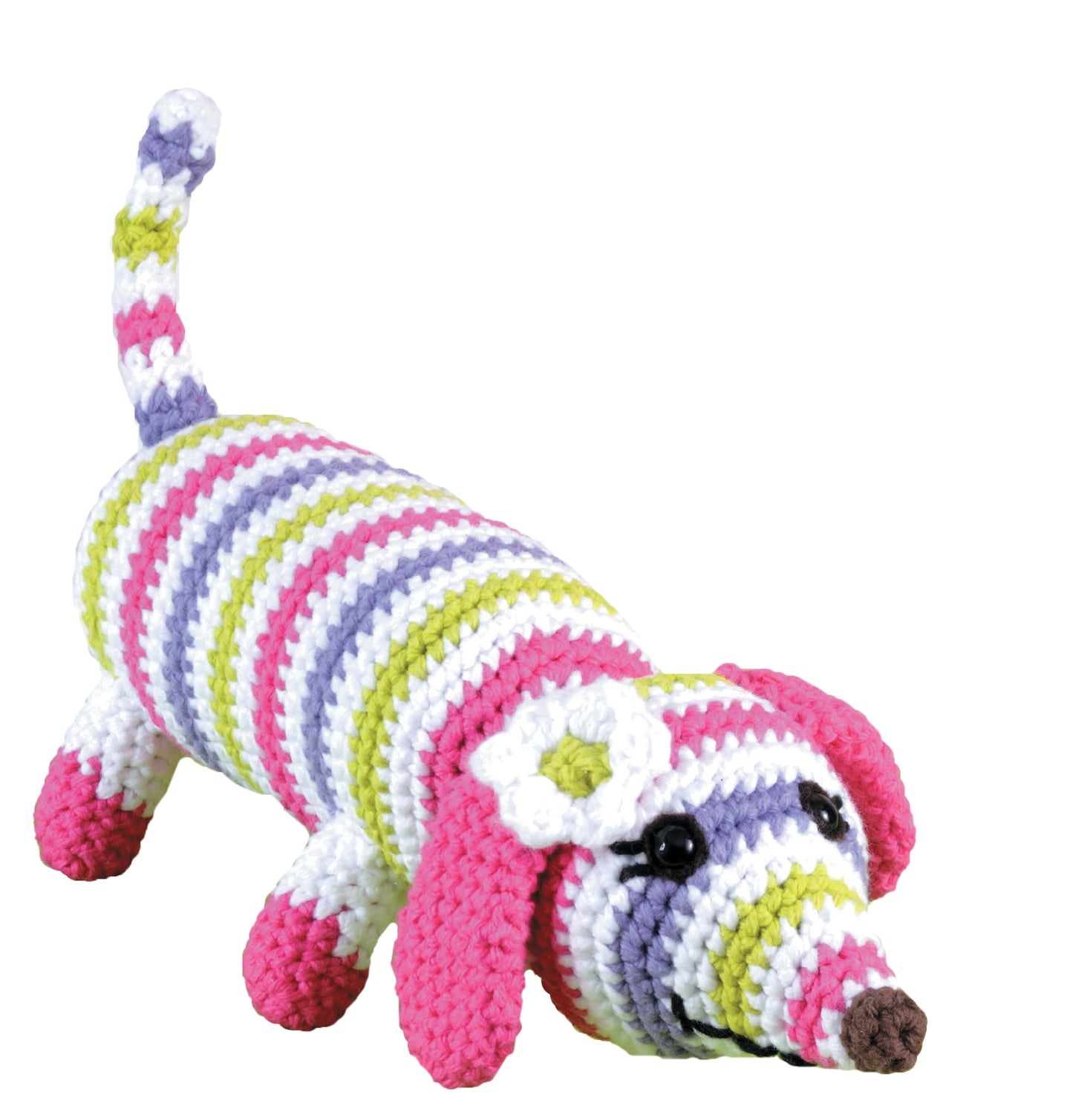 Leisure Arts’ Learn to Crochet Toys features a long-bodied, striped dog with pink ears, a flower on its head, brown nose, and curled tail—perfect for amigurumi or beginner crochet inspiration.