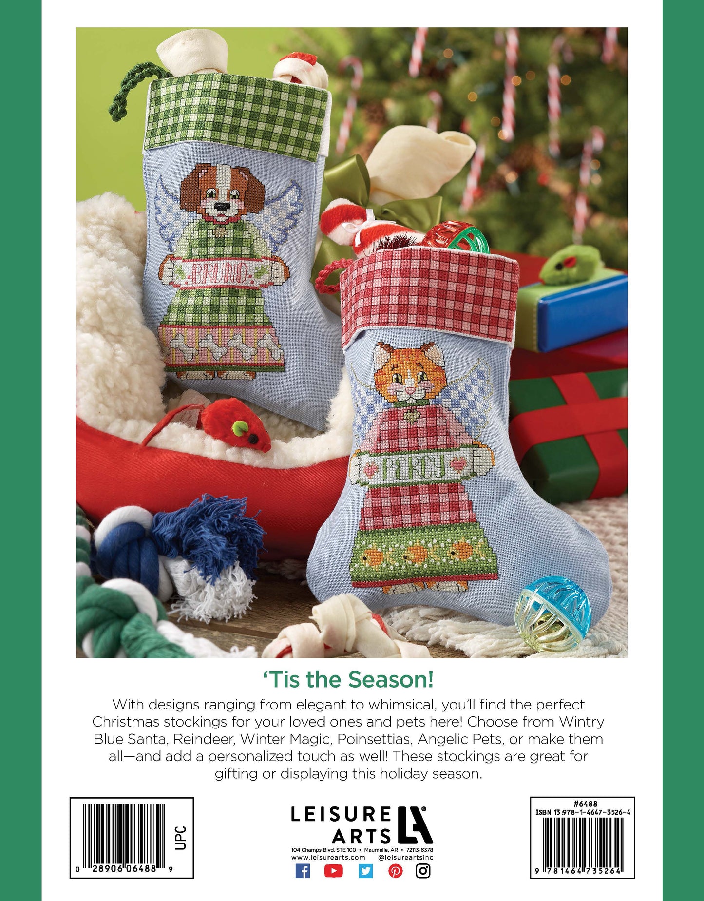 Leisure Arts Christmas Stockings—dog and cat designs, each labeled PURRFECT—are shown with yarn and ornaments. Perfect for beginners, these stockings can be personalized with the included alphabet.