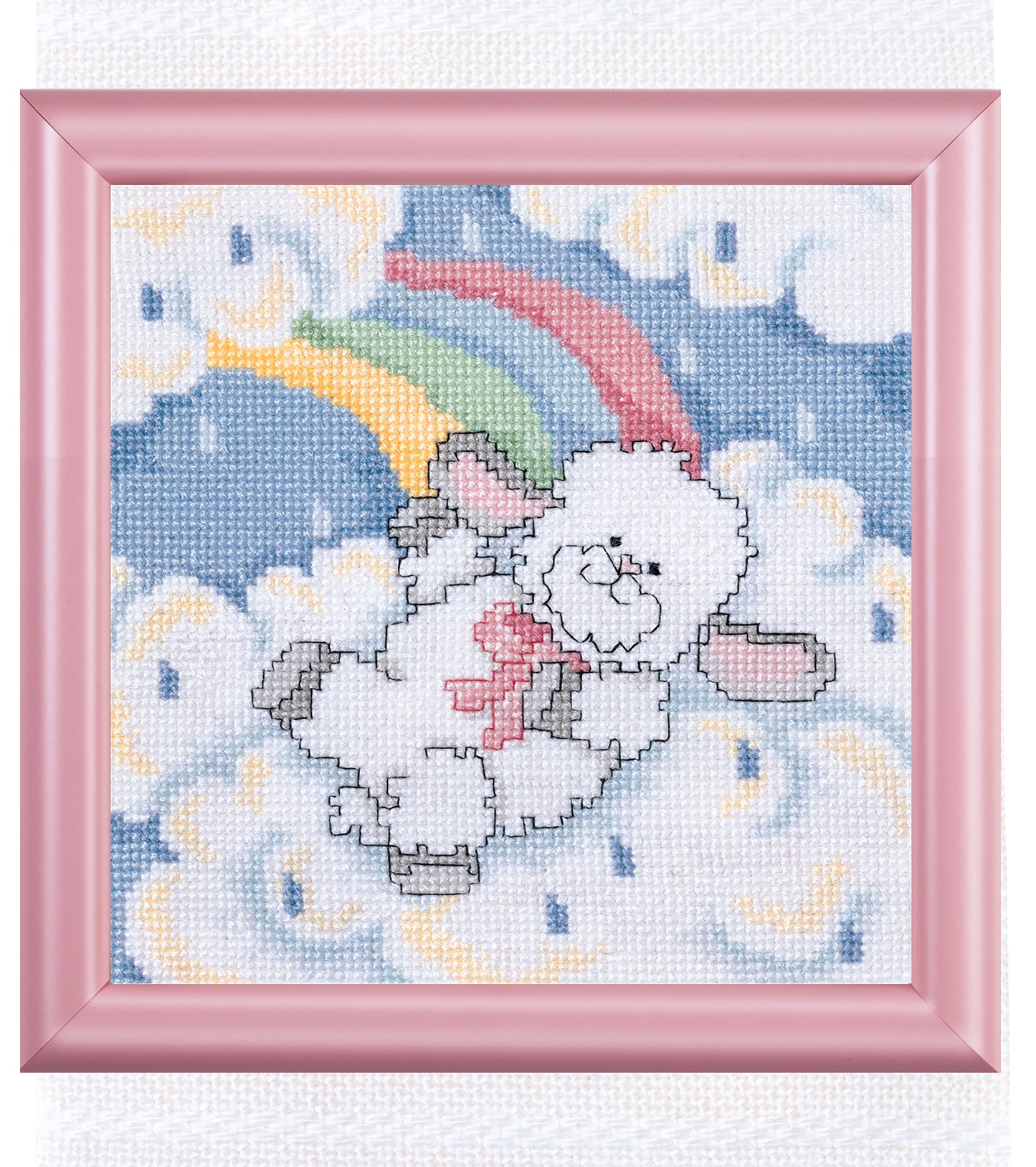 The Oh, Baby! Digital Download by Leisure Arts features counted cross stitch art of a white teddy bear with a pink bow floating among clouds under a rainbow on a blue sky, all in a pink frame.