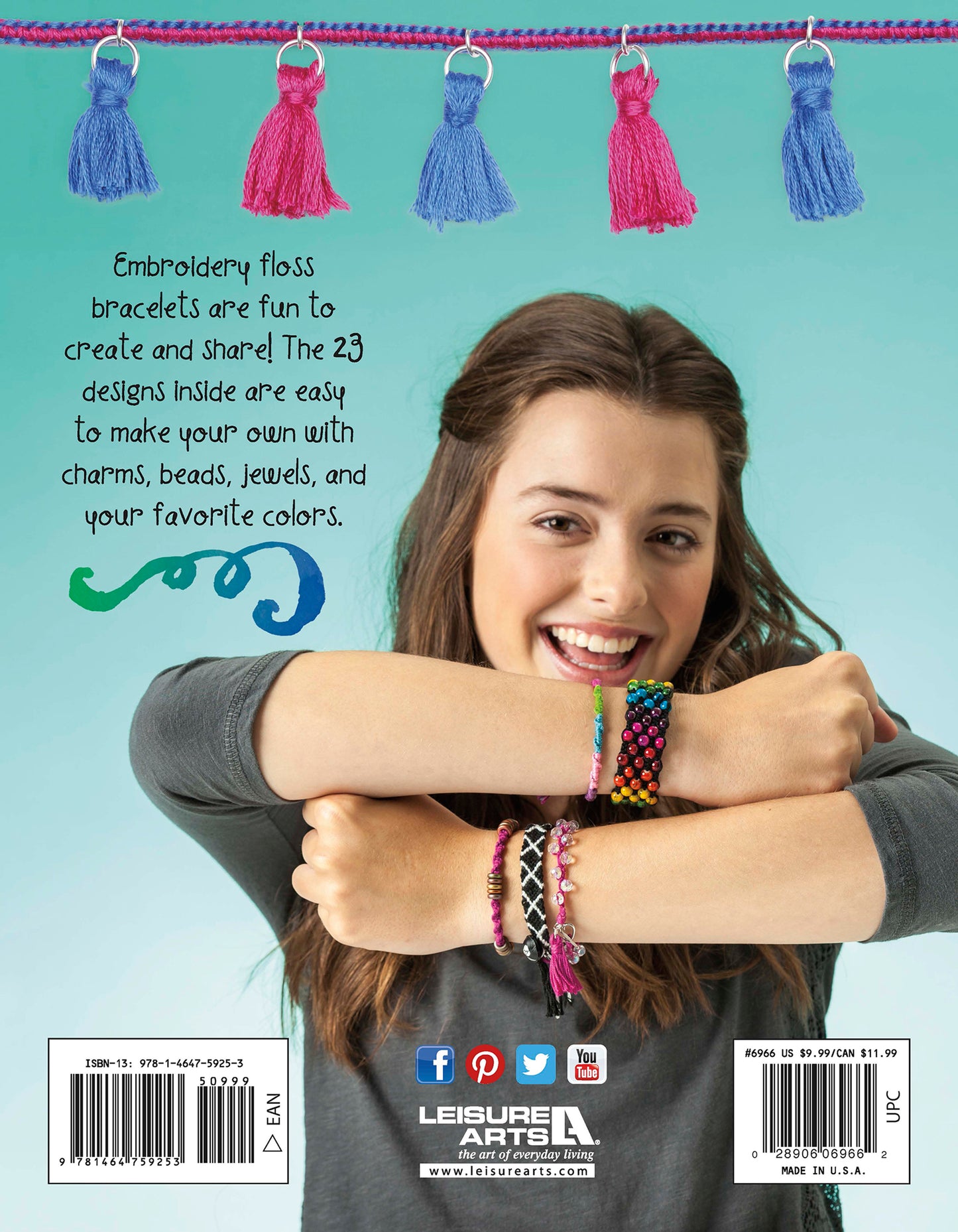 A smiling young woman with long brown hair displays colorful floss bracelets from Leisure Arts' Friendship Bracelets Reborn. Pink, purple, and blue tassels hang above her against a teal background with playful bracelet craft text.