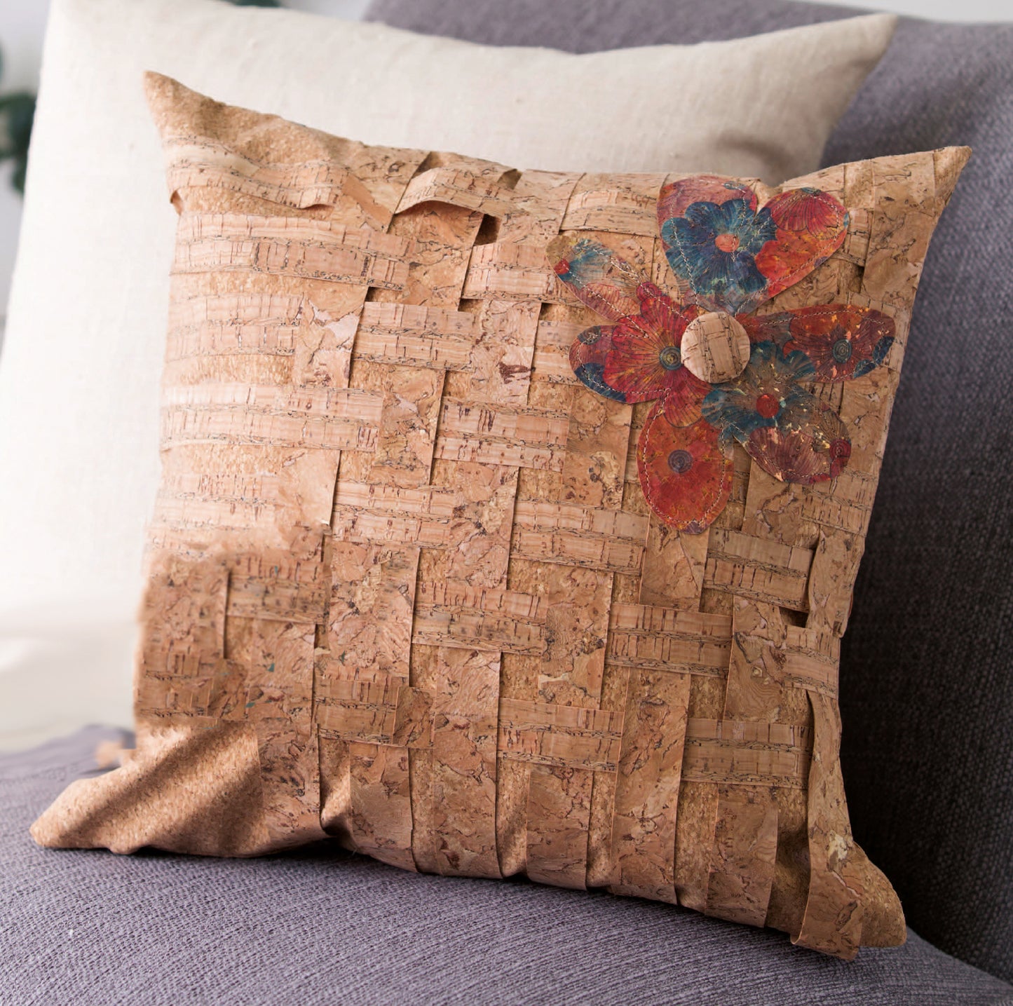 Cork Creations—20+ Modern Sew & No-Sew Cork Creations Digital Download by Leisure Arts offers stylish cork crafting ideas, like a pillow with a woven cork cover and red-blue flower embellishment, ideal for beginners.