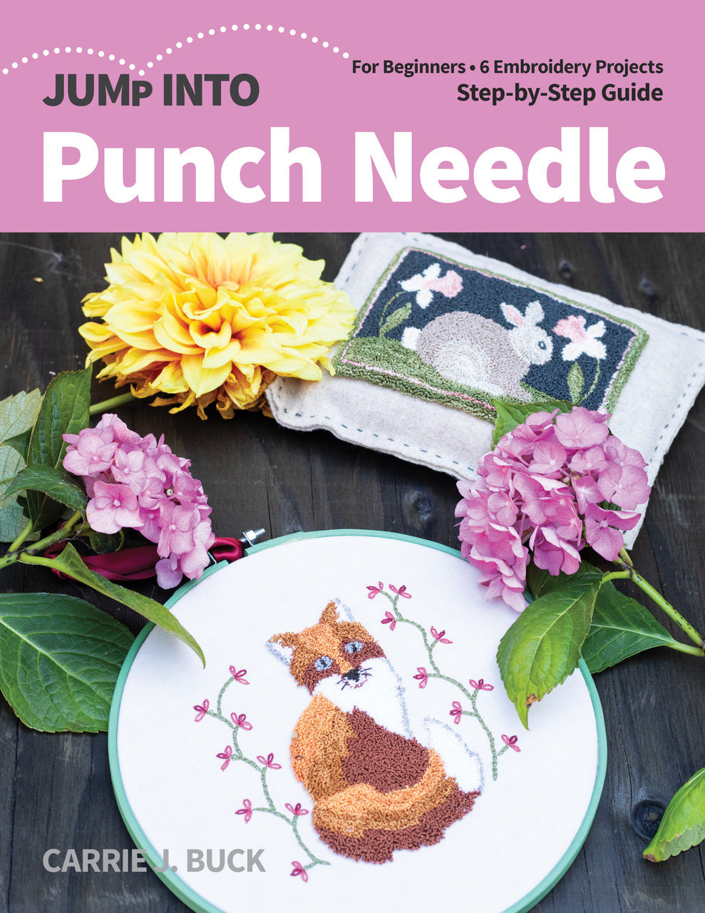 Jump Into Punch Needle by C&T Publishing features a floral punch needle embroidery and cat hoop art with fresh flowers on a dark wood background—perfect inspiration for fiber art beginners.