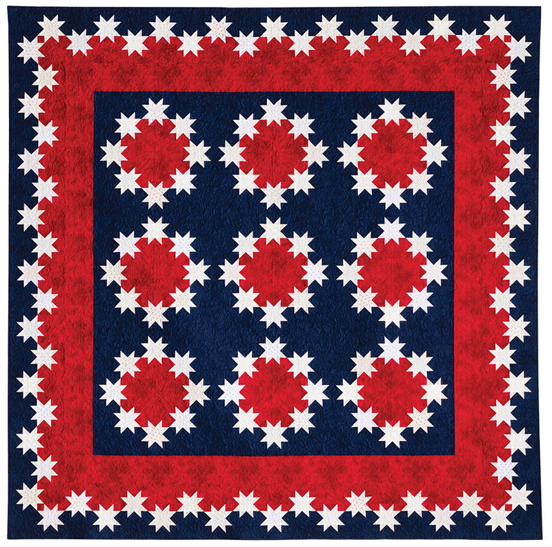 The Red, White & Blue Star Quilts by C&T Publishing features a patriotic square design with a blue background, twelve red starbursts each bordered by white stars, and finished with red, blue, and white star-trimmed borders.