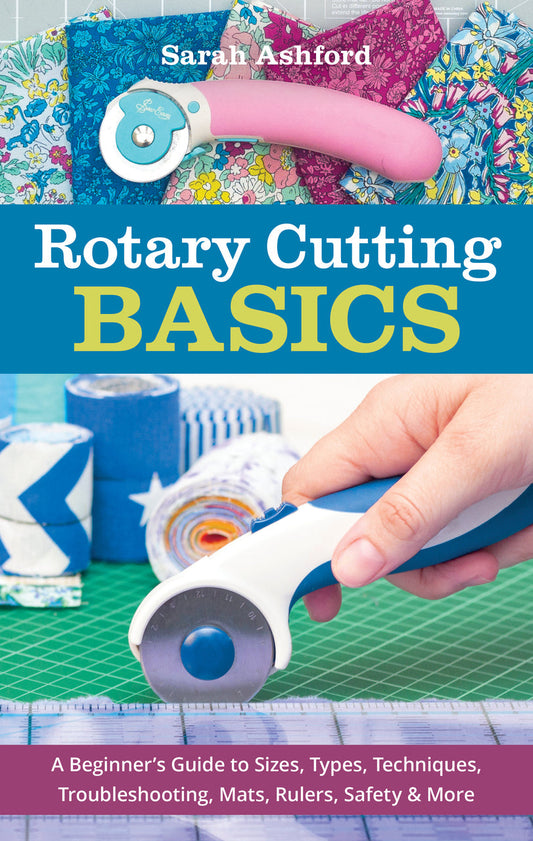 Book cover for Rotary Cutting Basics by C&T Publishing, showing a hand with a rotary cutter near quilting fabric and rulers, with essential rotary cutting techniques and colorful quilting patterns in the background.