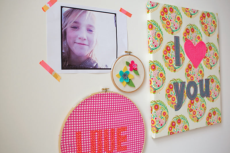 Create a fun wall display with My Sewing Workshop by FunStitch Studio—a canvas with floral “I ♥ you,” a photo of a young girl, and two embroidery hoops—perfect for inspiring kids' crafts and sewing projects.