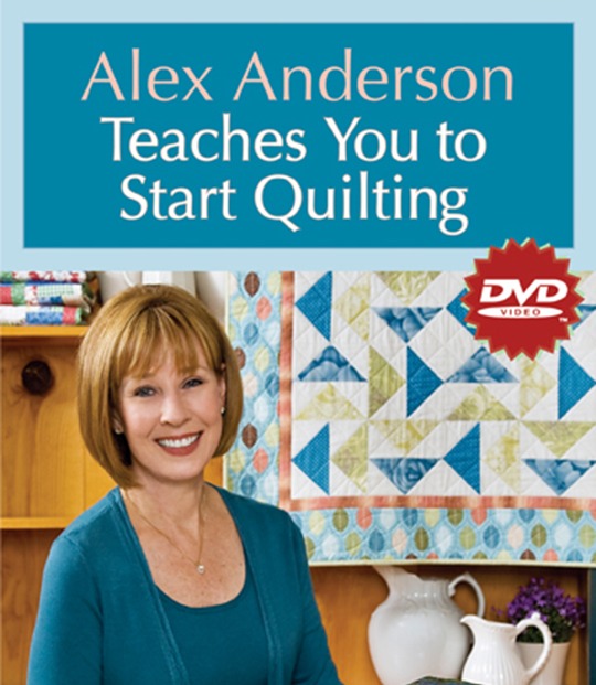 A smiling woman sits before a colorful quilt. The text reads “Creative Spark: Start Quilting!” with a red DVD label in the corner—perfect for anyone wanting to learn quilting basics.