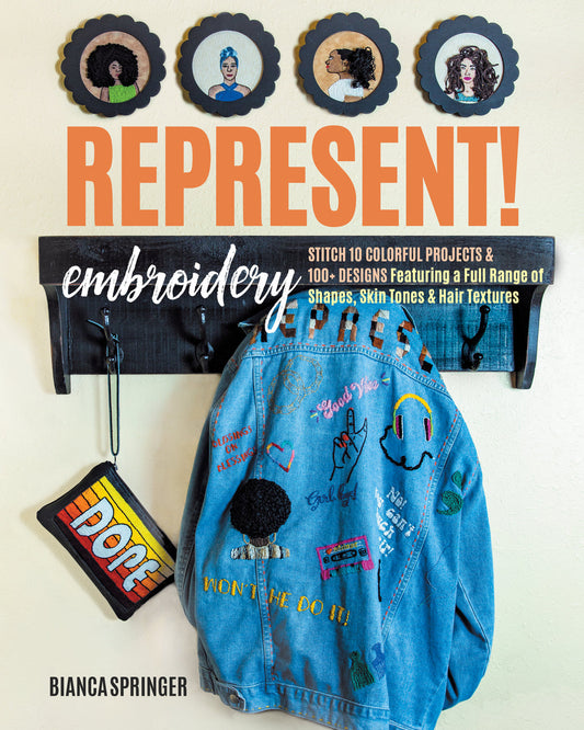 A denim jacket with inclusive embroidery hangs below framed embroidered portraits of diverse women. The text reads "Represent! Embroidery" by Stash Books.