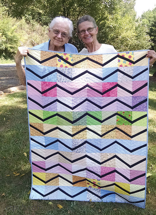 The Story Behind Magic Add-a-Strip Quilts