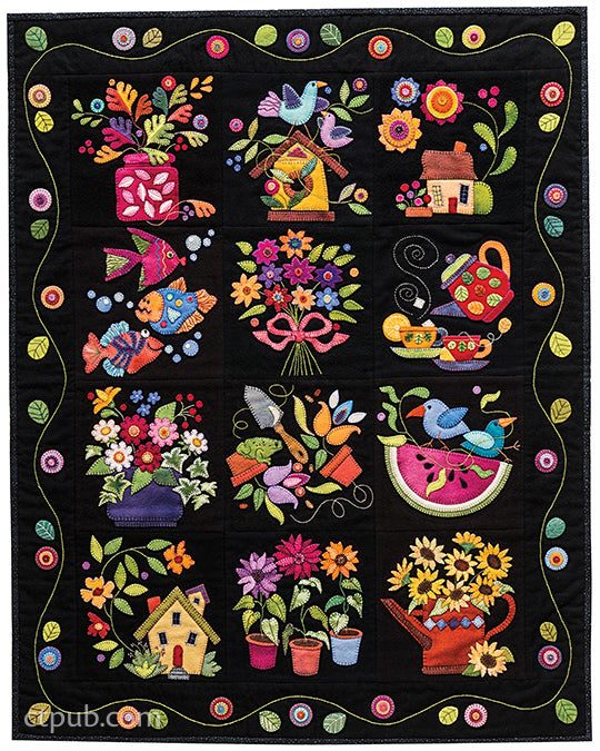 Add lively charm to any space with the Summertime Sampler Print-on-Demand Edition from C&T Publishing. This colorful quilt features twelve blocks showcasing vibrant wool appliqué designs—flowers, birds, fish, houses, a teapot, and a watering can—all set against a striking black background and bordered by a leafy vine with flowers. Carefully finished with hand-stitched details, this cheerful sampler is sure to brighten your home.