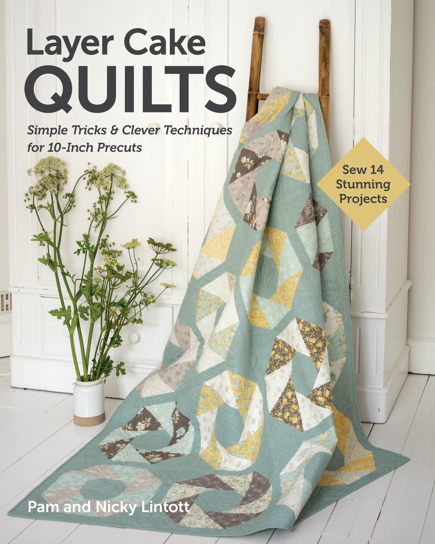 The book Layer Cake Quilts from Stash Books shows a vibrant patchwork quilt made with 10" precut squares, draped over a ladder. Its subtitle is Simple Tricks & Clever Techniques for 10-Inch Precuts by Pam and Nicky Lintott.