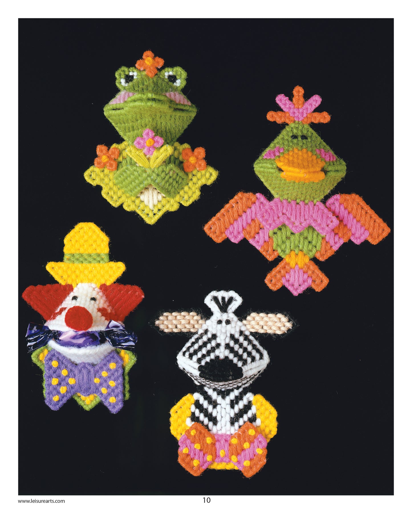 Leisure Arts’ Plastic Canvas Kissers Digital Download features four vibrant beginner magnets: a frog princess, crowned bird, clown with yellow hat and bow tie, and a black-and-white cow with a yellow base on black background.