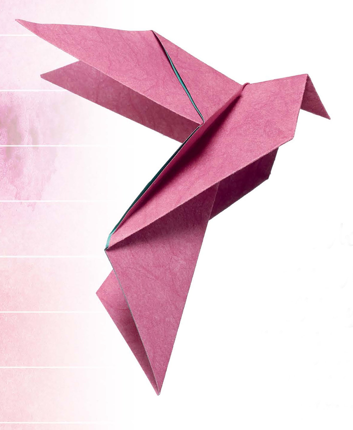 The “Origami Fun” kit by Leisure Arts features a pink origami bird with outstretched wings in flight against a pastel background—ideal inspiration for beginner to advanced origami projects.