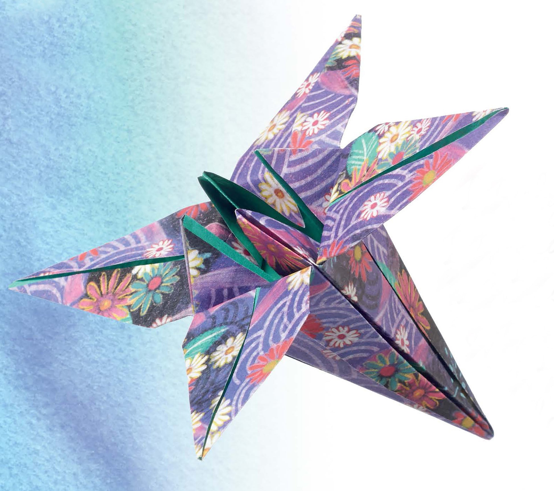 Origami Fun by Leisure Arts features a vibrant origami butterfly crafted from floral and wave patterned paper, ideal for origami projects or books, set on a soft blue and white gradient background.
