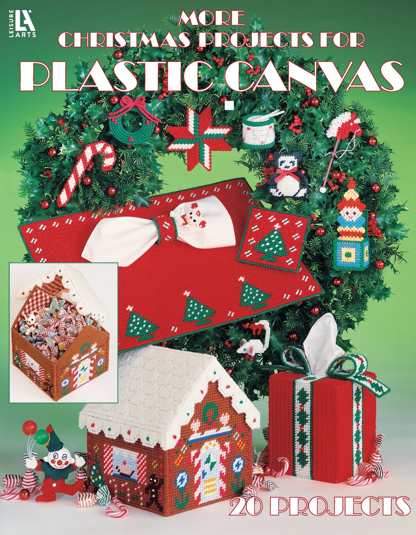 Cover of Leisure Arts’ "More Christmas Projects for Plastic Canvas," featuring beginner-friendly Christmas crafts like a wreath, gingerbread house, gift boxes, and festive ornaments in red, green, and white. Includes 20 fun projects.