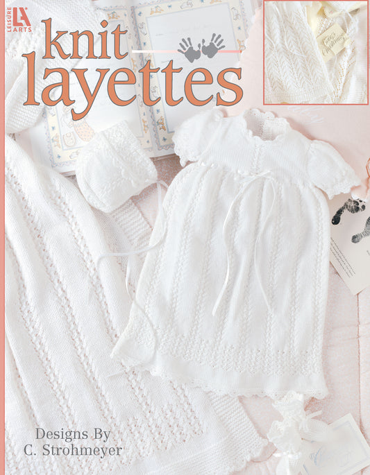 Cover of Leisure Arts' Knit Layette Digital Download, showcasing a delicate white newborn knit gown, bonnet, and booties set made with super fine yarn on a pastel background. Patterns designed by C. Strohmeyer.
