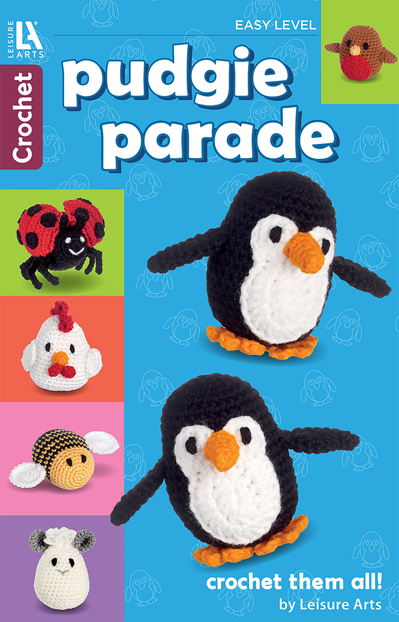 Cover of Leisure Arts’ Pudgie Parade Crochet shows beginner amigurumi patterns—penguin, ladybug, chicken, bee, sheep—on a blue background. Text: “Crochet them all!”.
