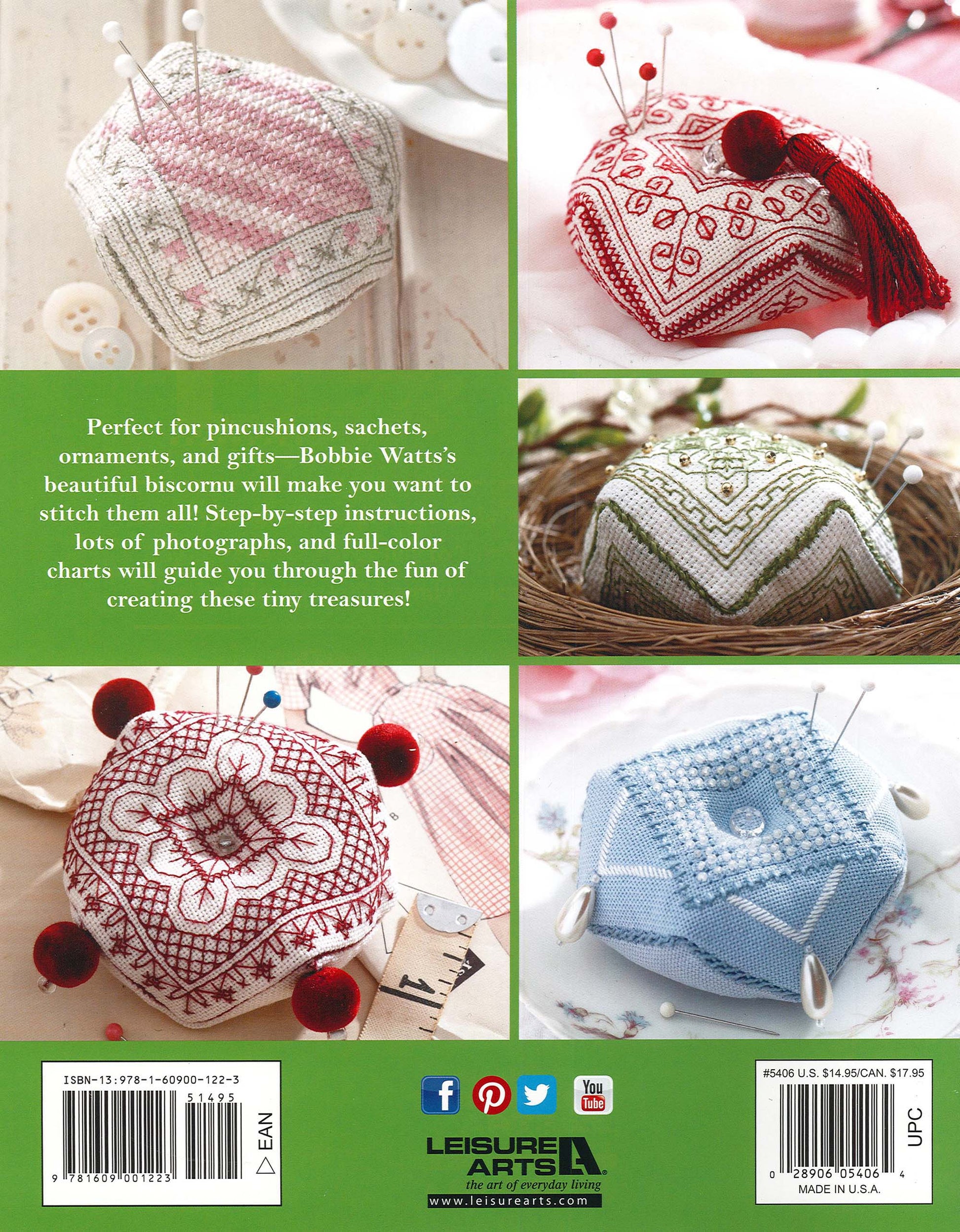 A collage displays five intricately embroidered Biscornu pincushions with pins, in red, pink, white, and blue. The center features a green box highlighting "Teach Yourself to Make Biscornu Digital Download" by Leisure Arts.