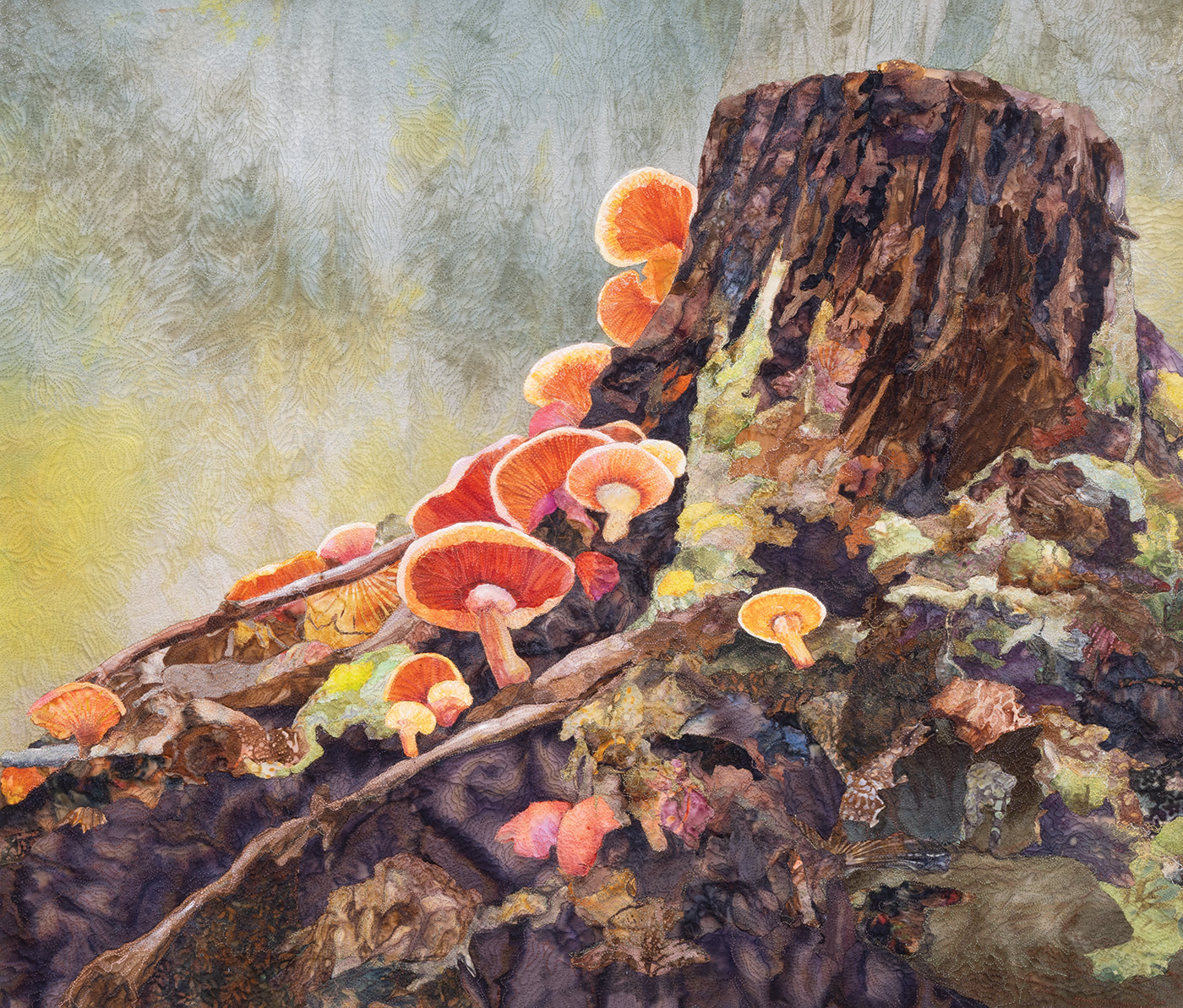 Bright orange mushrooms emerge from a textured, mossy tree stump against a soft, light-toned background in this intricate scene. Featuring the detailed, painted look characteristic of C&T Publishing’s Quilted Realism, the image highlights natural forms in an art quilt-inspired style.