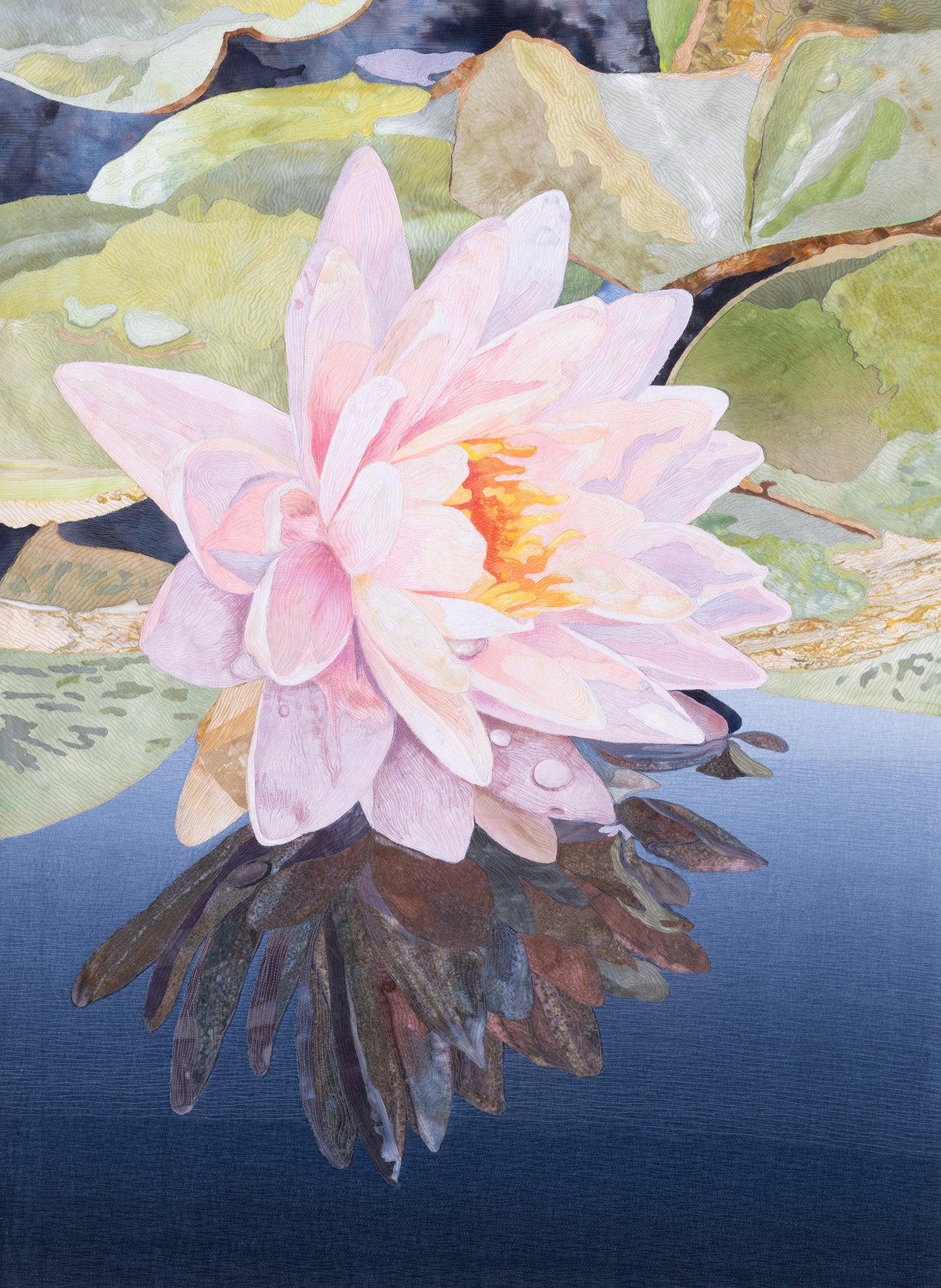 A pale pink water lily with a yellow center floats on water, encircled by green lily pads. Its reflection shimmers on the deep blue surface below, evoking the serene beauty that “Quilted Realism” by C&T Publishing captures in their photo-to-quilt artistry.