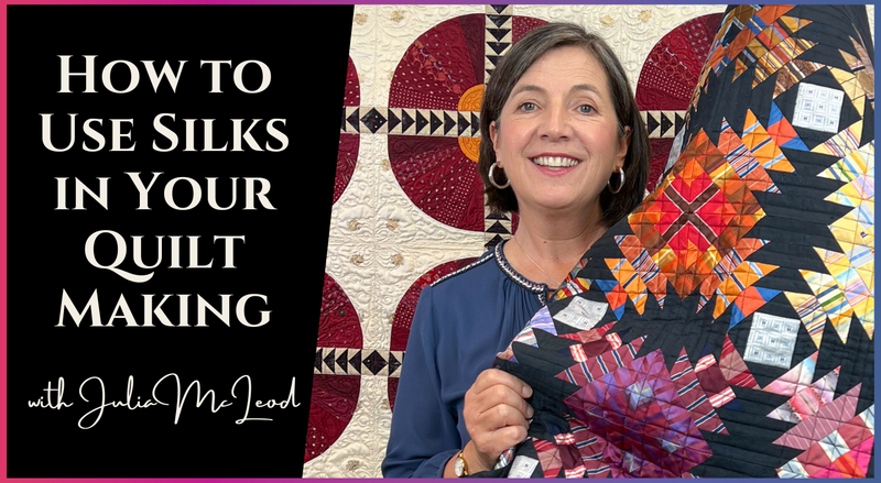 A smiling woman holds a colorful quilt before another quilted backdrop. Text reads: “How to Use Silks in Your Quilt Making with Julia McLeod.” Get tips and inspiration from Creative Spark for silk quilting.