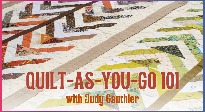 The Quilt-As-You-Go 101 by Creative Spark is a colorful quilt featuring zigzag patterns in earthy tones and diverse designs. The text QUILT-AS-YOU-GO 101 with Judy Gauthier is displayed in vibrant red and orange letters, showcasing the innovative technique.