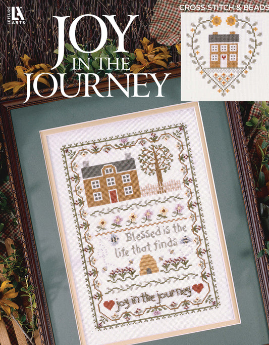 The "Joy in the Journey Digital Download" by Leisure Arts features cross stitch designs with a house, trees, flowers, "Joy in the Journey" at the top, and heart and house motifs—all as a convenient digital pattern.