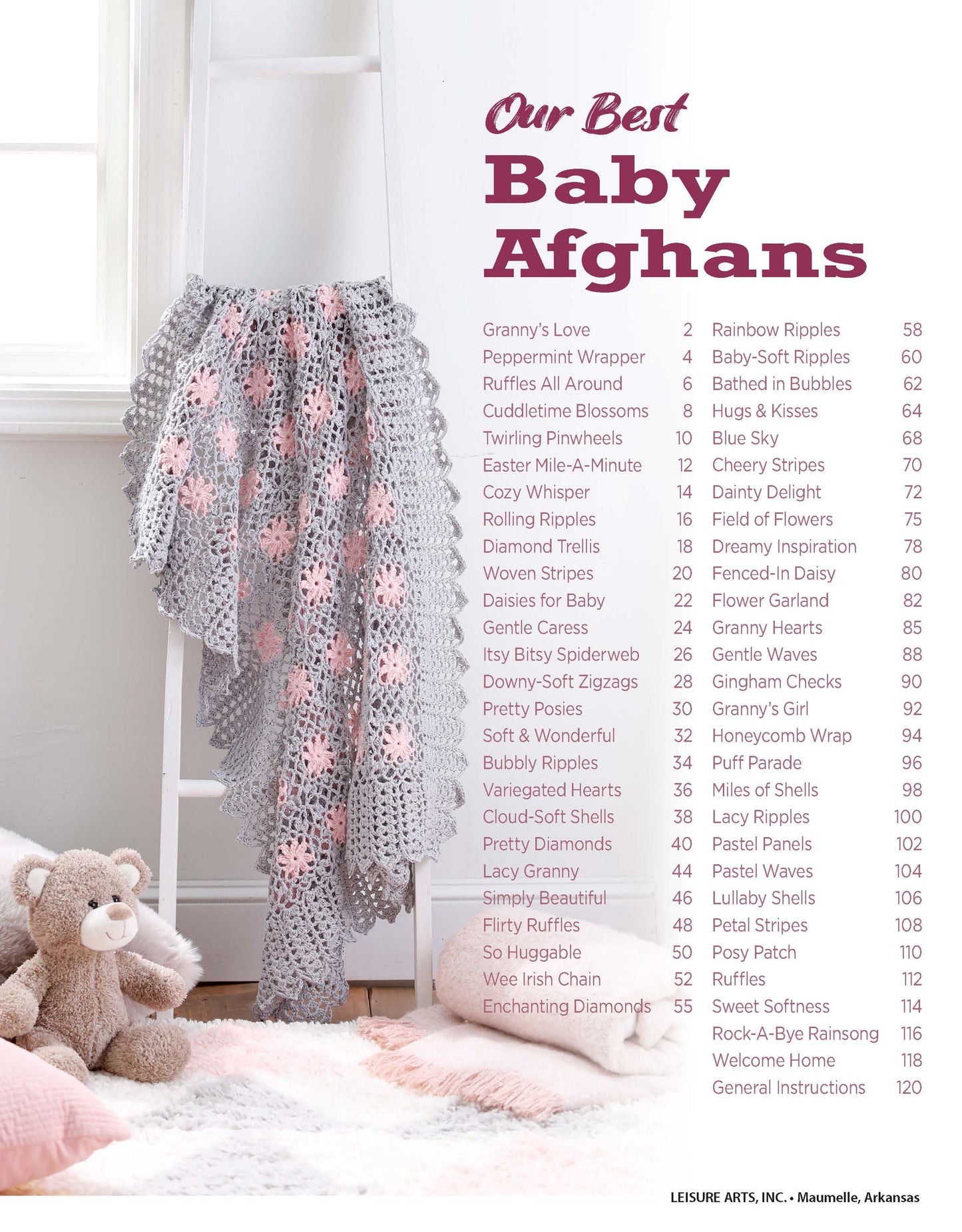 A soft gray and pink crocheted afghan, made from Leisure Arts' "Our Best Baby Afghans Digital Download," hangs over a white ladder near a plush teddy bear and ball. Thirty baby afghan pattern titles are listed in pink and purple text on the right.