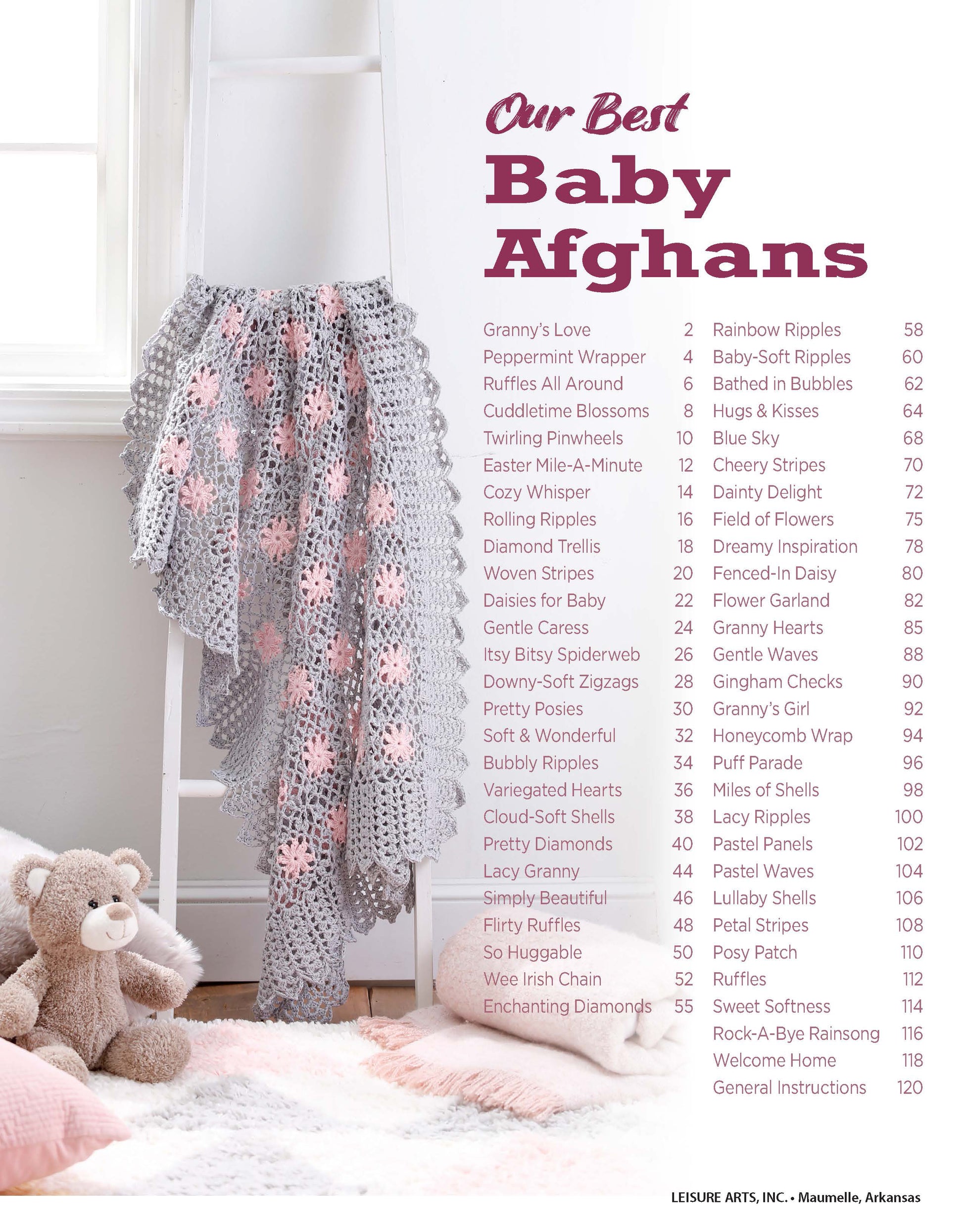 A soft gray and pink crocheted afghan, made from Leisure Arts' "Our Best Baby Afghans Digital Download," hangs over a white ladder near a plush teddy bear and ball. Thirty baby afghan pattern titles are listed in pink and purple text on the right.