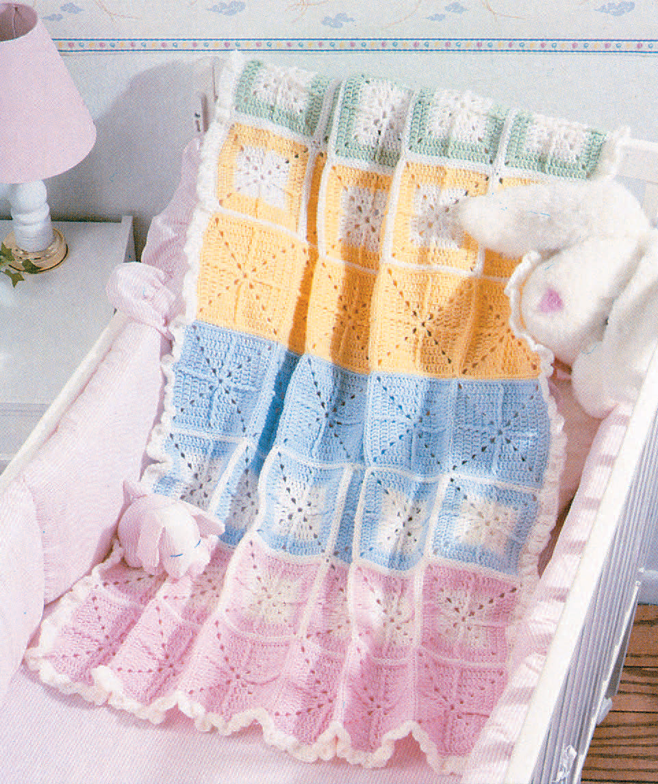 The Snuggle-Up Baby Afghans—8 Projects Digital Download by Leisure Arts features pastel crochet patterns for beginners, including a baby blanket in white, yellow, blue, and pink squares—ideal for nursery décor.