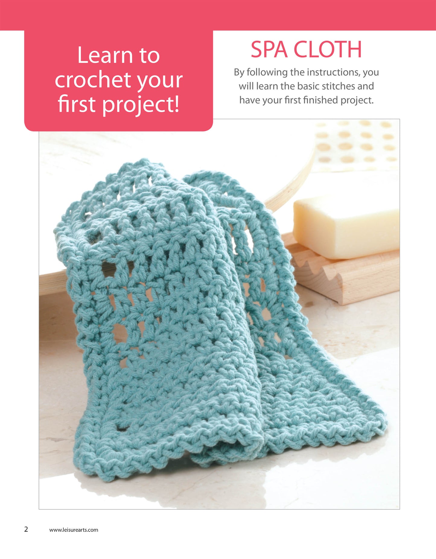 A light blue crocheted spa cloth is displayed on a countertop with a soap bar and dish. Featuring Leisure Arts' "Learn to Crochet Now! Digital Download"—the perfect beginner’s crochet project.
