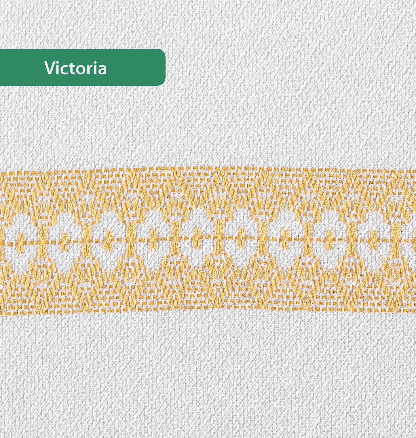 The Easy-Does-It Swedish Weave Towels by Leisure Arts feature white textured fabric with a horizontal band of intricate yellow geometric and floral patterns. A green label in the top left reads "Victoria.