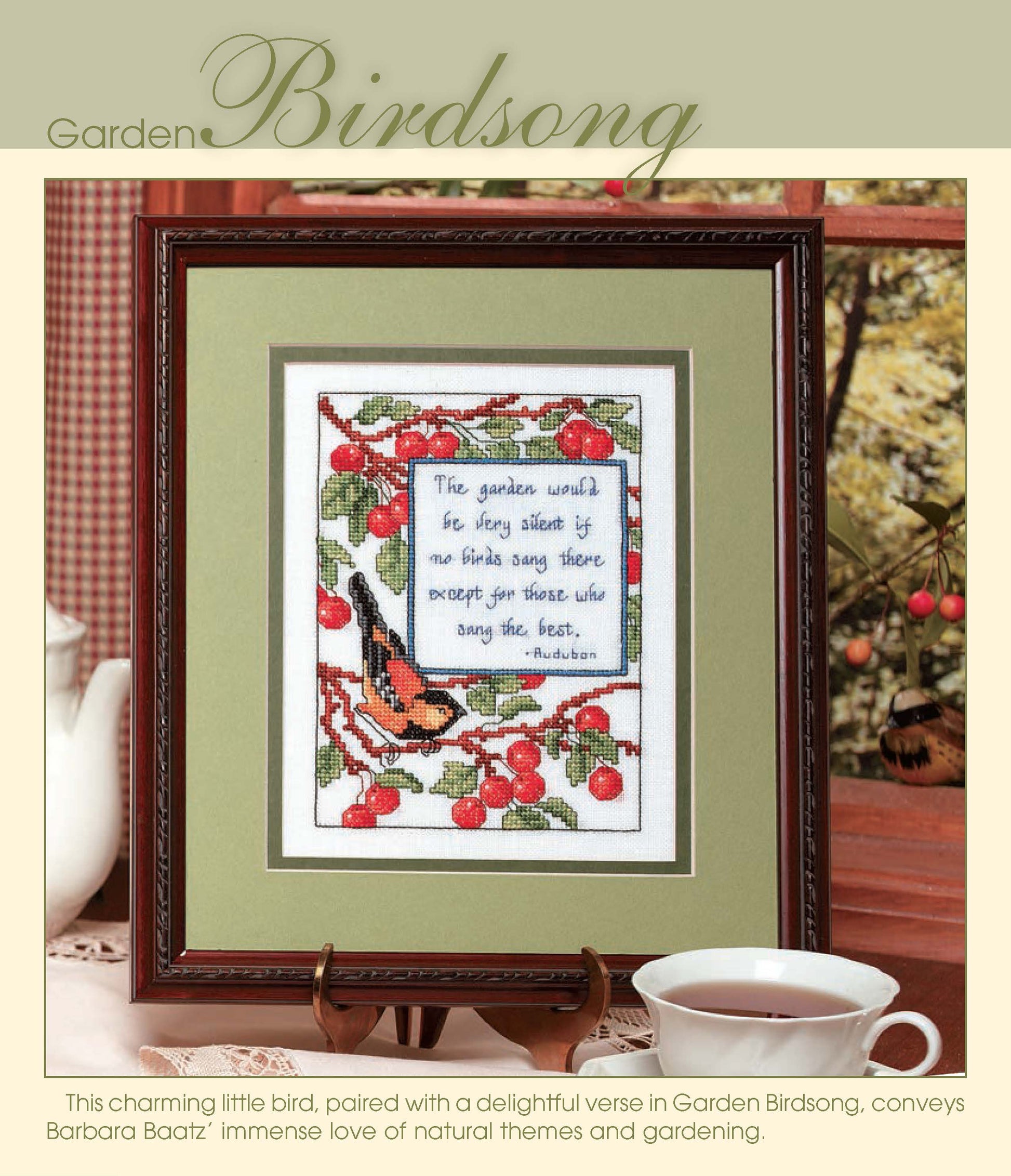 Simply Inspirational by Leisure Arts is a framed cross stitch art showing a bird on a cherry branch with a verse, tea set in the foreground, and greenery through a window, all expertly stitched on Aida cloth.