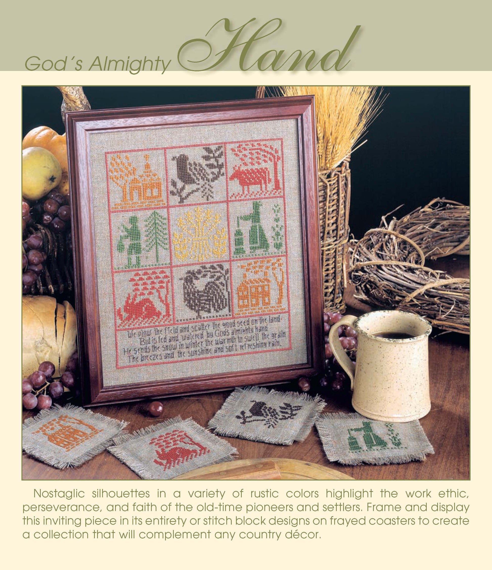 The Simply Inspirational set by Leisure Arts features a framed cross stitch sampler and three coasters in rustic earth tones, displayed with grapes, a basket, and a mug for a cozy vintage country decor touch.