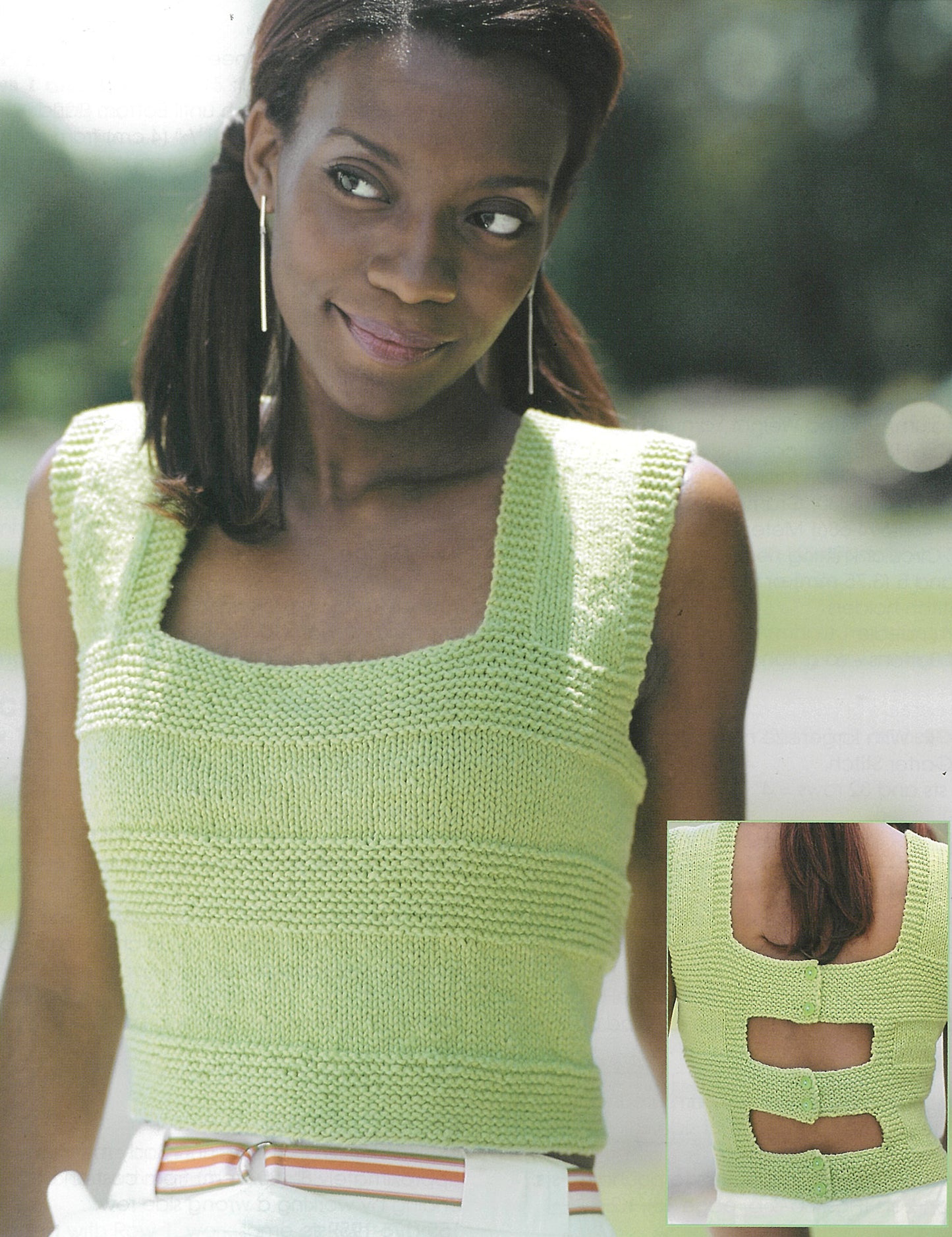 A woman wears Leisure Arts’ Knit Tops for You—a light green, sleeveless top with a square neckline and textured bands. The back inset highlights three open horizontal bands connected by knit strips. She poses outdoors, glancing aside.