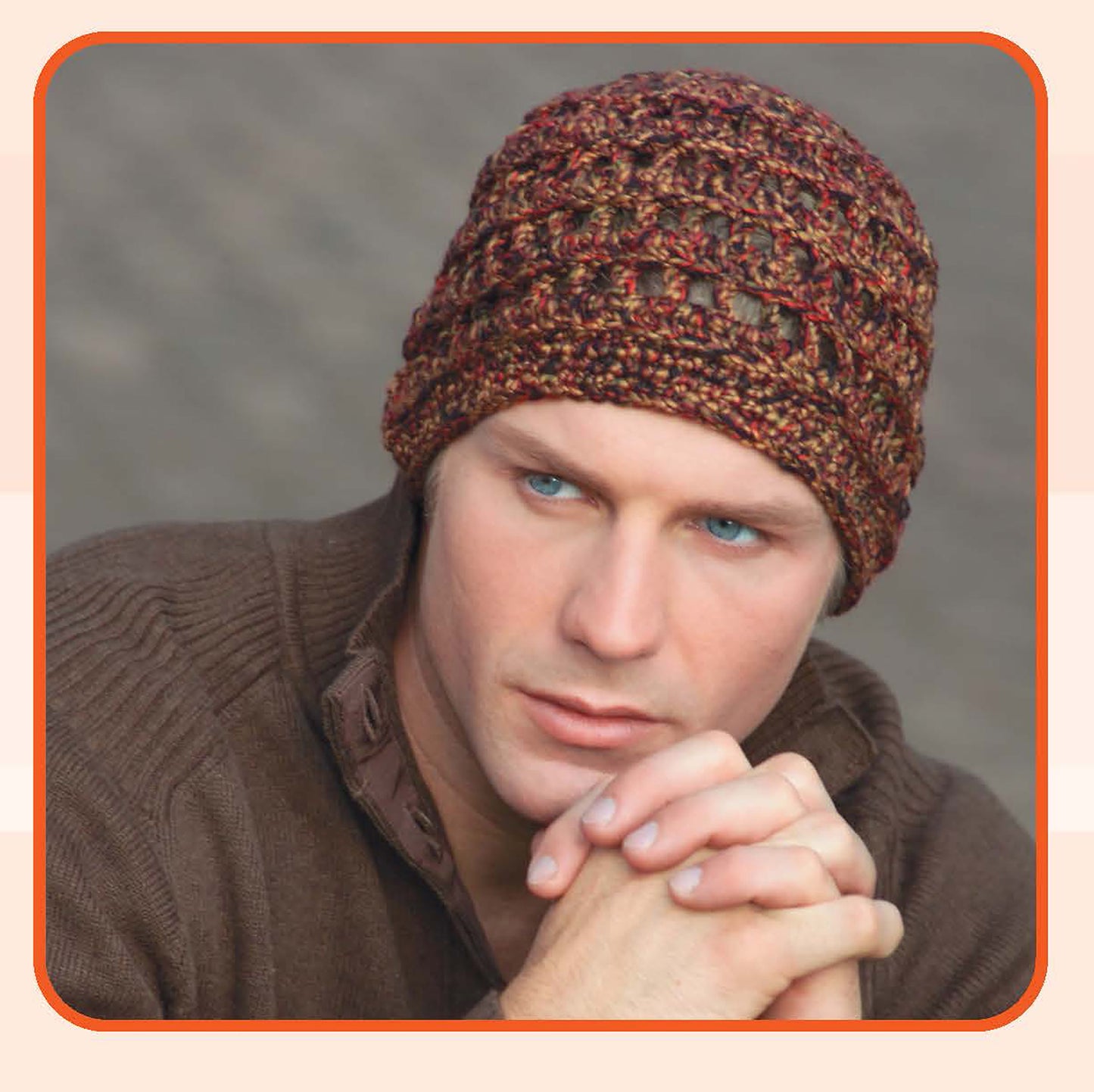 A man wears a brown crochet beanie and sweater, looking thoughtfully to the side—an inspiring example for anyone exploring Leisure Arts' Quick Caps—7 Crochet Designs for beginner-friendly hat patterns.