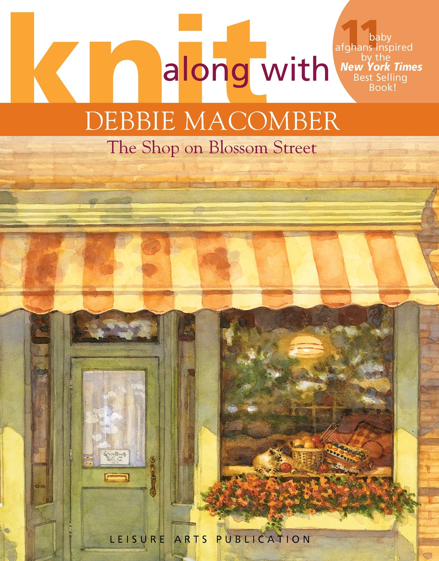 Book cover for Knit Along with Debbie Macomber—The Shop on Blossom Street by Leisure Arts, featuring an illustrated storefront with a green door, flowers, and yarn. Orange and white text overlays the design—ideal for baby afghan enthusiasts.