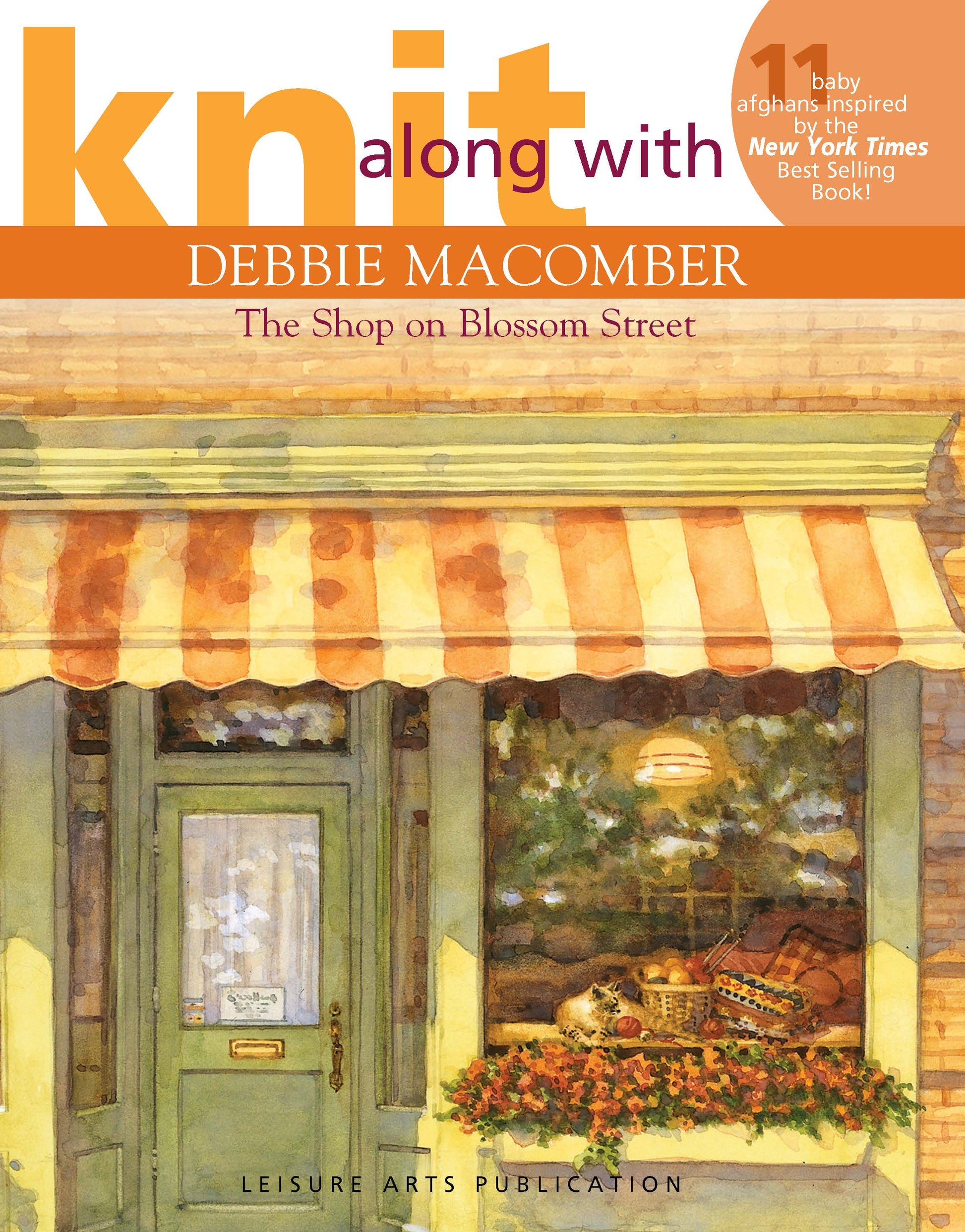 Book cover for Knit Along with Debbie Macomber—The Shop on Blossom Street by Leisure Arts, featuring an illustrated storefront with a green door, flowers, and yarn. Orange and white text overlays the design—ideal for baby afghan enthusiasts.