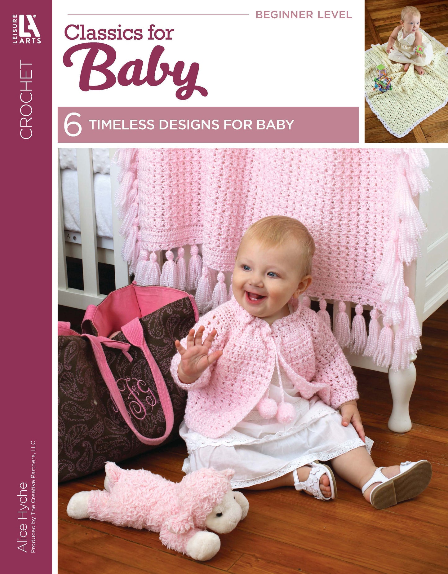 A smiling baby in a pink sweater sits near a pink bag and stuffed animal by a crib with a pom pom afghan. This cover image is for "Crochet Classics for Baby" by Leisure Arts, featuring cute baby crochet patterns and beginner projects.
