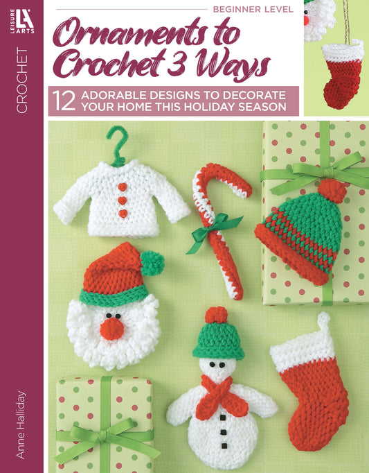 The cover of Leisure Arts' "Ornaments to Crochet 3 Ways" shows six beginner crochet ornaments—white sweater, candy cane, mini stocking, Santa hat, tree, and snowman—perfect holiday decorations for green and white wrapped gifts.