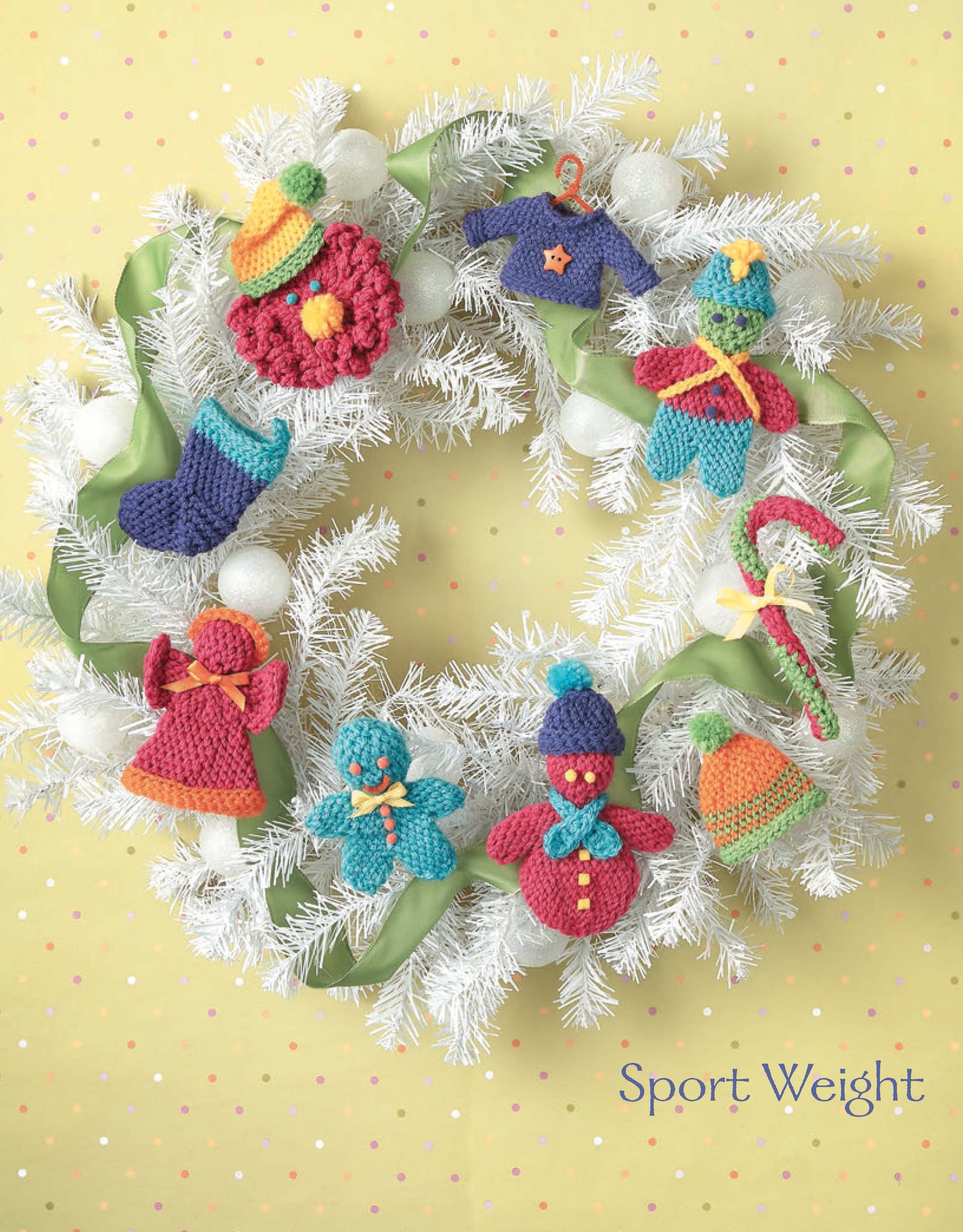 Ornaments to Crochet 3 Ways by Leisure Arts: a white wreath with green ribbon and crochet holiday ornaments—stocking, angel, gingerbread, snowman, hat, mitten, star, wreath—ideal for beginners. Shown on a yellow background.