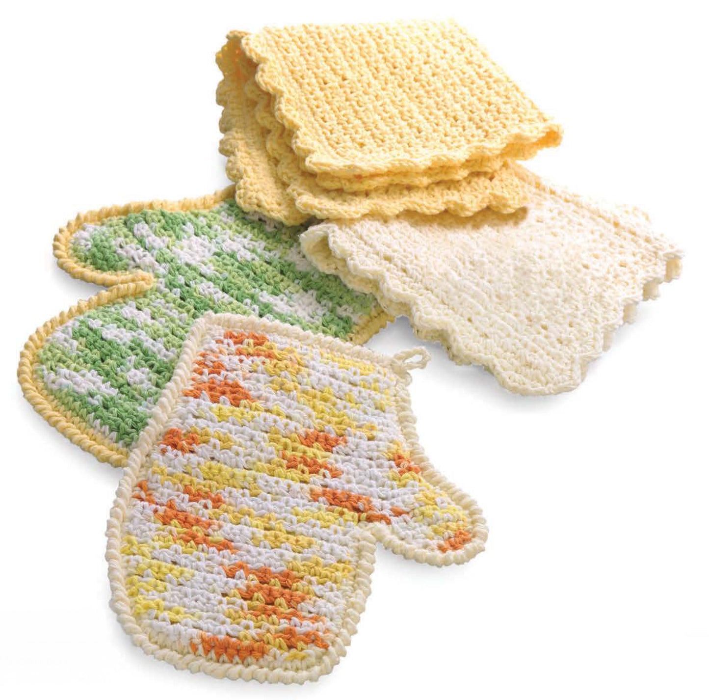 Four Crocheted dishcloths and mitts from Leisure Arts’ Crochet on the Go! are shown in pastel yellow, cream, green, and orange-yellow with textured scalloped edges—ideal for playful projects and beginner crafts.