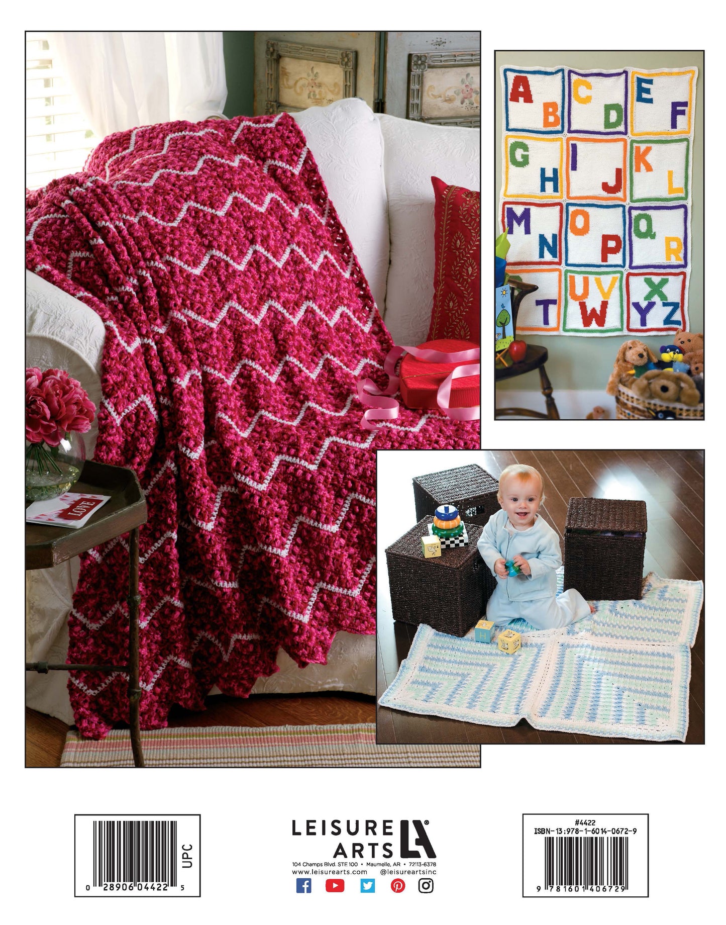 A baby sits on a pale crocheted mat with toys, next to a white armchair draped with a red and white blanket from Afghans for All Reasons & All Seasons by Leisure Arts; a colorful alphabet wall hanging decorates the space.