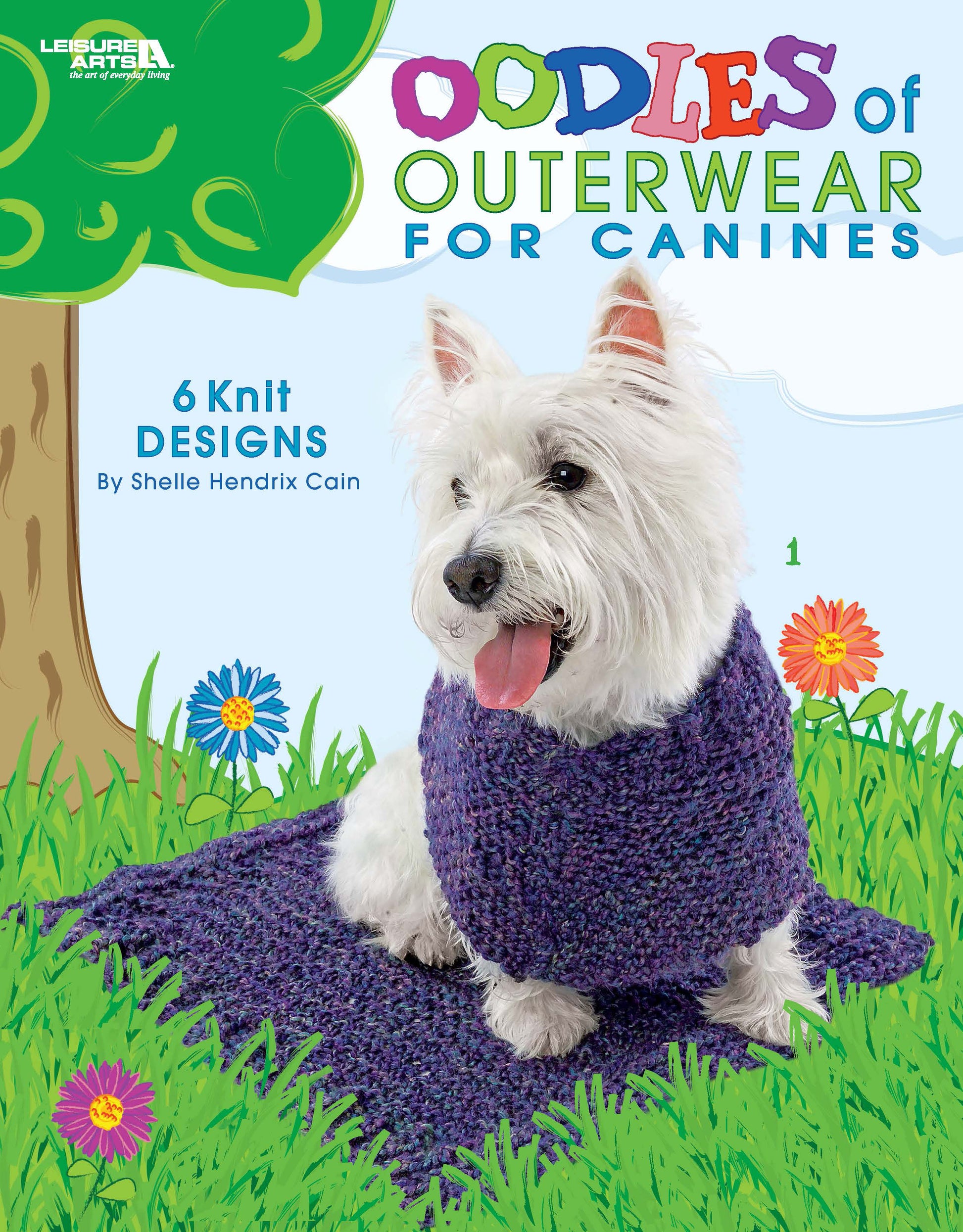 A small white dog in a purple knit scarf sits on grass with flowers. Text: Oodles of Outerwear for Canines by Leisure Arts—6 knit designs for dogs. The background shows trees and a blue sky.