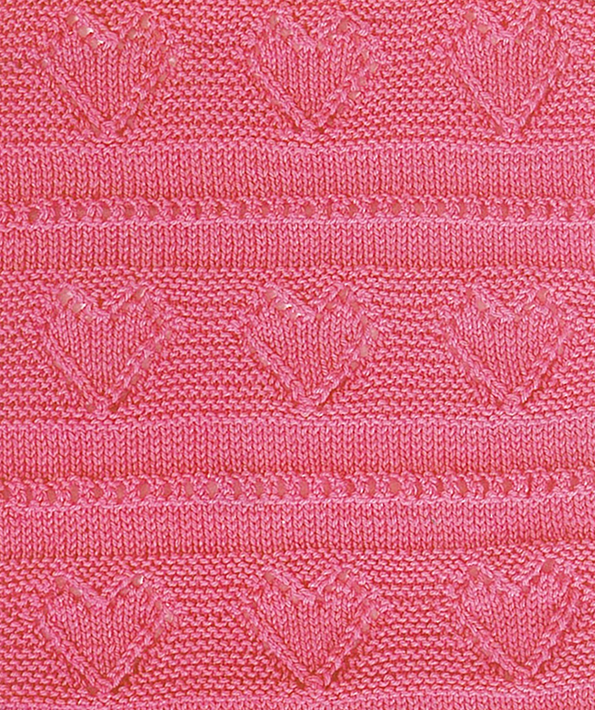 The “Lots of Love Knits for Kids” from Leisure Arts features pink textured knitting with raised heart patterns and decorative bands, perfect for cozy baby projects or children’s sweaters using worsted weight yarn.