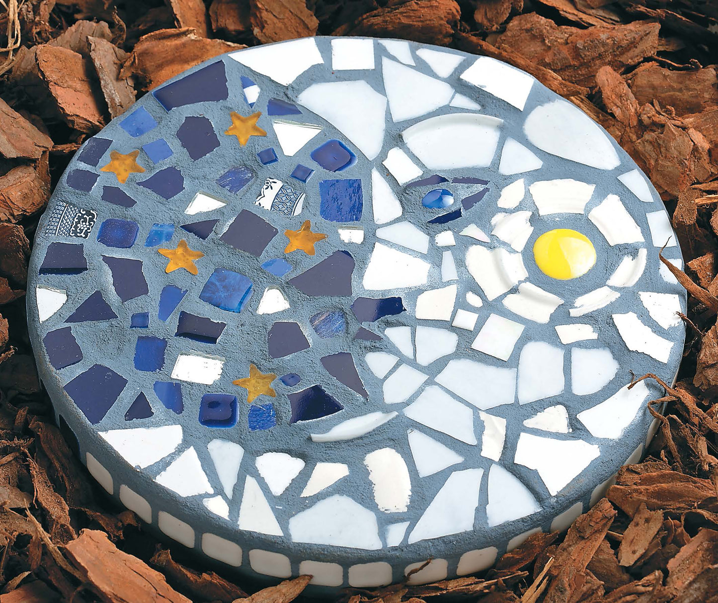 Heidi Borchers' Beginner's Guide to Mosaics by Leisure Arts teaches you to create stunning mosaic designs, like a moon and sun with star shapes and vibrant tiles—a unique addition to your home decor.