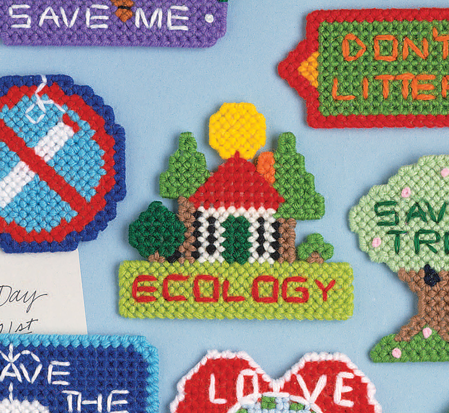 Ecology Magnets Plastic Canvas Digital Download by Leisure Arts includes beginner-friendly, colorful needlepoint designs with ecology messages: a house with trees labeled “ECOLOGY,” “SAVE TREES,” “DON’T LITTER,” and “SAVE ME” signs.