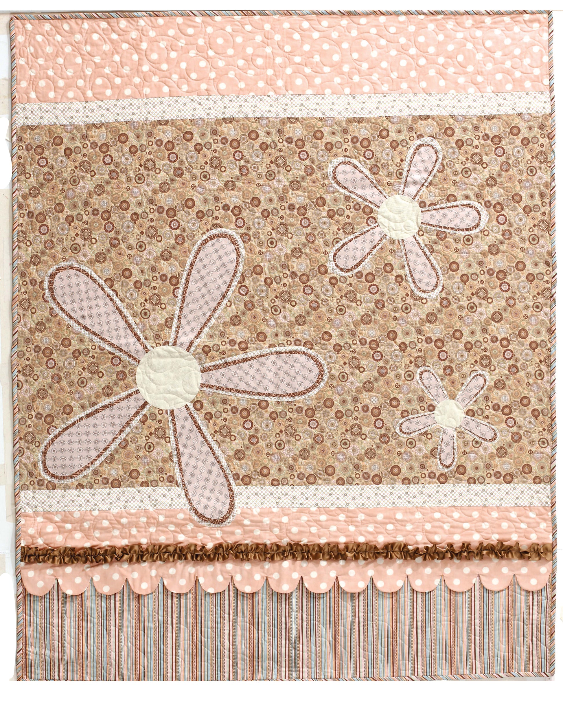 Leisure Arts’ "Big Fun with a Little Fabric" features handmade quilts with pink, beige, and brown fabrics, daisy appliqués, lace trim, and playful polka dot accents—ideal for applique quilt lovers or fat quarter projects.