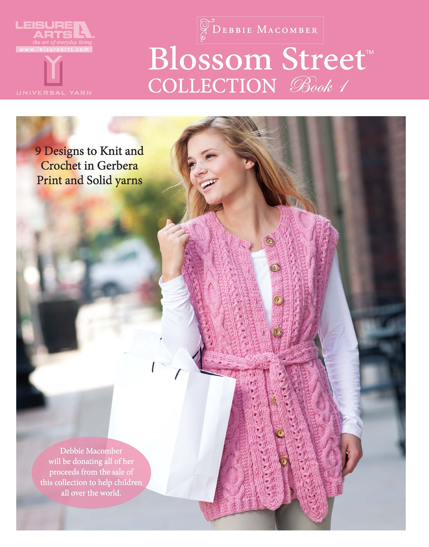 A woman in a pink knitted vest poses outdoors with shopping bags, featuring Blossom Street Collection Book 1 by Leisure Arts—9 knitting and crochet patterns using worsted weight yarn.