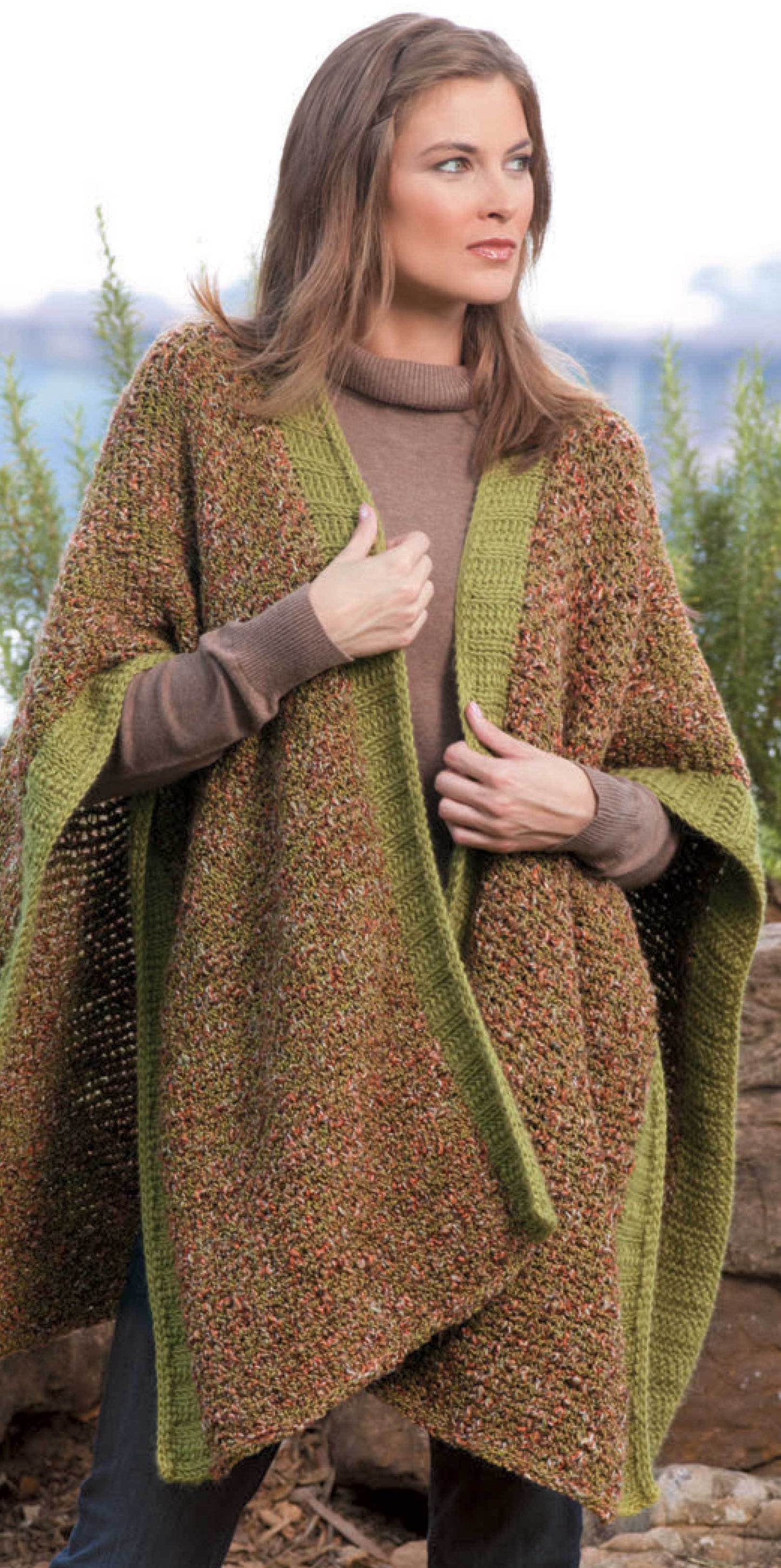 A woman outdoors in a multicolored knit poncho and brown turtleneck inspires easy projects with medium weight yarn—perfect for crafters using Leisure Arts' "Ultimate Beginner's Guide to Tunisian Crochet.